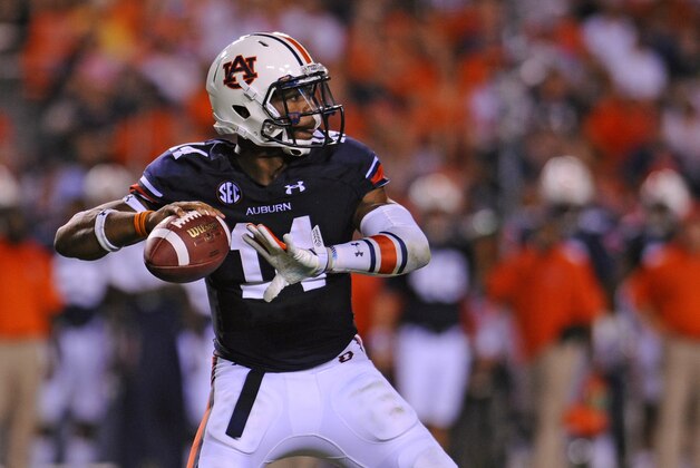 Sep 6, 2014; Auburn, AL, USA; Auburn Tigers quarterback Nick Marshall (14) looks to pass during the second half against the San Jose State Spartans at Jordan Hare Stadium. The Tigers defeated the Spartans 59-13. Mandatory Credit: Shanna Lockwood-USA TODAY Sports