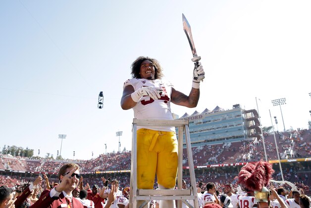 PALO ALTO, CA - SEPTEMBER 06: Leonard Williams #94 of the USC Trojans leads the USC marching band after they beat the Stanford Cardinal at Stanford Stadium on September 6, 2014 in Palo Alto, California. (Photo by Ezra Shaw/Getty Images) PALO ALTO, CA - SEPTEMBER 06: Leonard Williams #94 of the USC Trojans leads the USC marching band after they beat the Stanford Cardinal at Stanford Stadium on September 6, 2014 in Palo Alto, California. (Photo by Ezra Shaw/Getty Images)