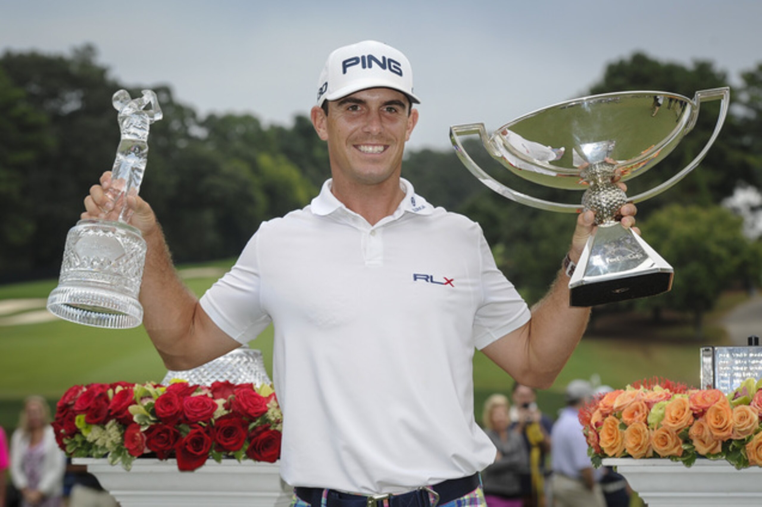 Bill Horschel poses with both trophies after winning the Tour Championship golf tournament and The FedEX Cup, Sunday, Sept 14, 2014, in Atlanta. (AP Photo/John Amis)