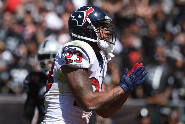 September 14, 2014; Oakland, CA, USA; Houston Texans running back Arian Foster (23) celebrates after scoring a touchdown against the Oakland Raiders during the first quarter at O.co Coliseum. Mandatory Credit: Kyle Terada-USA TODAY Sports