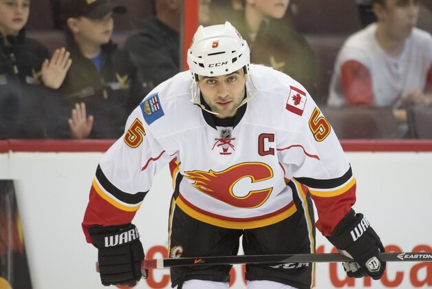 Mar 30, 2014; Ottawa, Ontario, CAN; Calgary Flames defenseman Mark Giordano (5) during warmup prior to the game against the Ottawa Senators at Canadian Tire Centre. Mandatory Credit: Marc DesRosiers-USA TODAY Sports