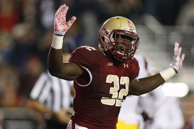 BOSTON, MA- SEPTEMBER 13:  Running back Jon Hilliman #32 of the Boston College Eagles celebrates his touchdown during the second half of BC's 37-31 win against the USC Trojans at Alumni Stadium on September 13 in Chestnut Hill, Massachusetts.  (Photo by Winslow Townson/Getty Images)