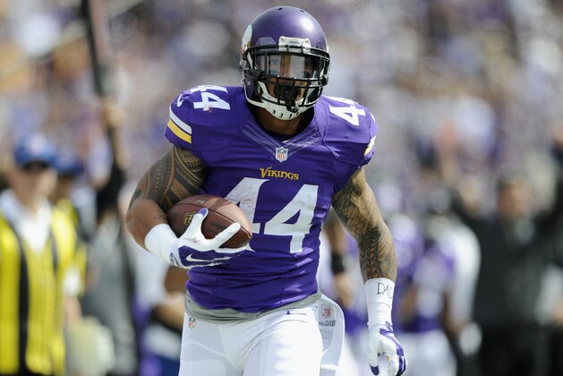 MINNEAPOLIS, MN - SEPTEMBER 14: Matt Asiata #44 of the Minnesota Vikings carries the ball during the first quarter of the game against the New England Patriots on September 14, 2014 at TCF Bank Stadium in Minneapolis, Minnesota. Asiata scored a touchdown on the play. (Photo by Hannah Foslien/Getty Images)