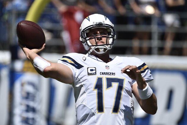 San Diego Chargers quarterback Philip Rivers (17) warms-up before an NFL football game against the Seattle Seahawks on Sunday, Sept. 14, 2014, in San Diego. (AP Photo/Denis Poroy) San Diego Chargers quarterback Philip Rivers (17) warms-up before an NFL football game against the Seattle Seahawks on Sunday, Sept. 14, 2014, in San Diego. (AP Photo/Denis Poroy)