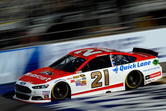 BROOKLYN, MI - AUGUST 16: Ryan Blaney, temporary driver of the #21 Motorcraft/Quick Lane Tire & Auto Center Ford, during practice for the NASCAR Sprint Cup Series Pure Michigan 400 at Michigan International Speedway on August 16, 2014 in Brooklyn, Michigan.  (Photo by Jared C. Tilton/Getty Images)
