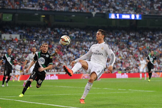 MADRID, SPAIN - AUGUST 25: Cristiano Ronaldo of Real Madrid controls the ball the ball during the La liga match between Real Madrid CF and Cordoba CF at Estadio Santiago Bernabeu on August 25, 2014 in Madrid, Spain. (Photo by Denis Doyle/Getty Images) MADRID, SPAIN - AUGUST 25: Cristiano Ronaldo of Real Madrid controls the ball the ball during the La liga match between Real Madrid CF and Cordoba CF at Estadio Santiago Bernabeu on August 25, 2014 in Madrid, Spain. (Photo by Denis Doyle/Getty Images)