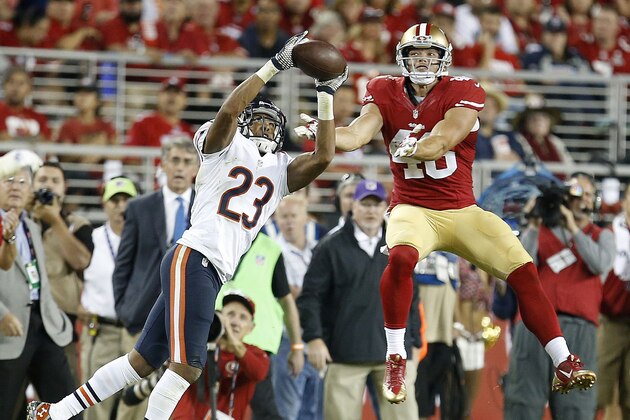 Chicago Bears cornerback Kyle Fuller (23) intercepts a pass intended for San Francisco 49ers tight end Derek Carrier during the fourth quarter of an NFL football game in Santa Clara, Calif., Sunday, Sept. 14, 2014. (AP Photo/Tony Avelar)