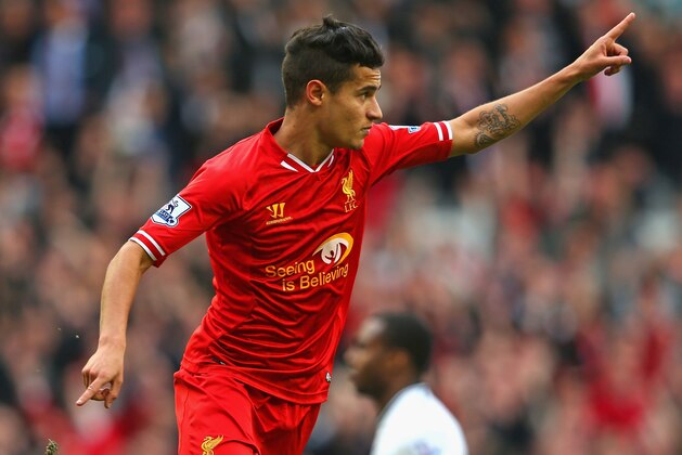 LIVERPOOL, ENGLAND - MARCH 30:  Philippe Coutinho of Liverpool celebrates scoring the third goal during the Barclays Premier League match between Liverpool and Tottenham Hotspur at Anfield on March 30, 2014 in Liverpool, England.  (Photo by Alex Livesey/Getty Images)
