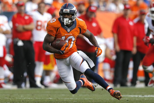 Denver Broncos wide receiver Emmanuel Sanders (10) runs against the Kansas City Chiefs during the second half of an NFL football game, Sunday, Sept. 14, 2014, in Denver. (AP Photo/Jack Dempsey)