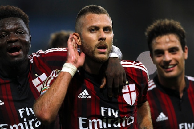 PARMA, ITALY - SEPTEMBER 14:  Jeremy Menez (C) of AC Milan celebrates his goal with his team-mate Sulley Ali Muntari (L)during the Serie A match between Parma FC and AC Milan at Stadio Ennio Tardini on September 14, 2014 in Parma, Italy.  (Photo by Marco Luzzani/Getty Images)