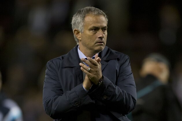 Chelsea's manager Jose Mourinho applauds supporters as he walks from the pitch after his team's 3-1 win at Burnley in their English Premier League soccer match at Turf Moor Stadium, Burnley, England, Monday Aug. 18, 2014. (AP Photo/Jon Super) Chelsea's manager Jose Mourinho applauds supporters as he walks from the pitch after his team's 3-1 win at Burnley in their English Premier League soccer match at Turf Moor Stadium, Burnley, England, Monday Aug. 18, 2014. (AP Photo/Jon Super)