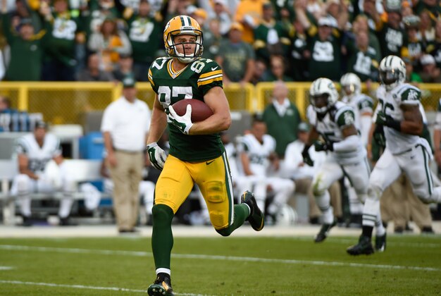 Sep 14, 2014; Green Bay, WI, USA; Green Bay Packers wide receiver Jordy Nelson (87) runs after catching a pass for an 80-yard touchdown score in the third quarter against the New York Jets at Lambeau Field. Mandatory Credit: Benny Sieu-USA TODAY Sports