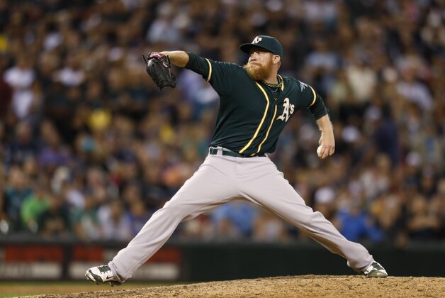 Oakland Athletics pitcher Sean Doolittle works against the Seattle Mariners during ta baseball game on Saturday, Sept. 13, 2014 in Seattle. (AP Photo/John Froschauer)