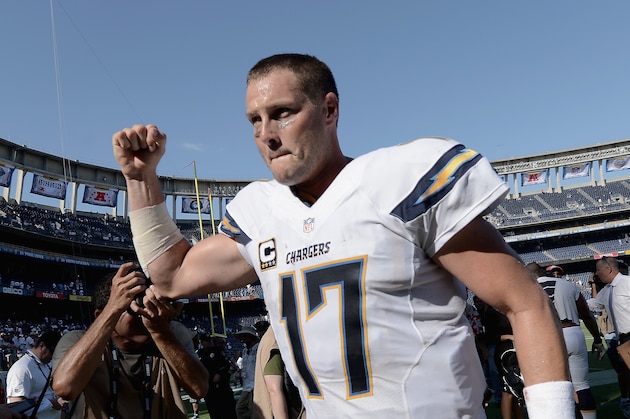 SAN DIEGO, CA - SEPTEMBER 14:  Quarterback Philip Rivers #17 of the San Diego Chargers waves to the fans after defeating the Seattle Seahawks 30-21 at Qualcomm Stadium on September 14, 2014 in San Diego, California.  (Photo by Donald Miralle/Getty Images)
