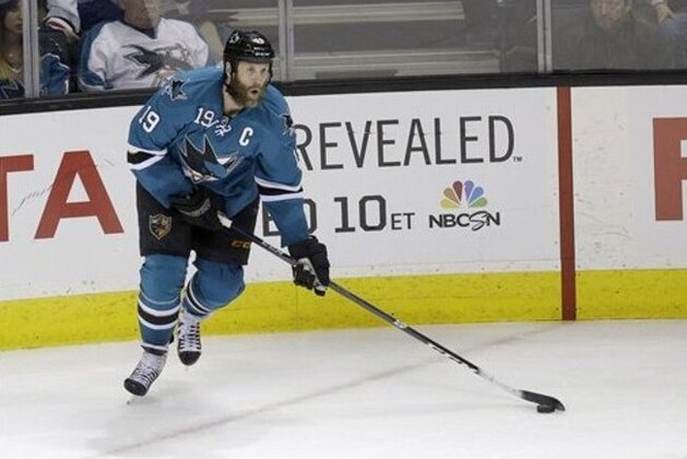 San Jose Sharks center Joe Thornton (19) in action against the Chicago Blackhawks during an NHL hockey game in San Jose, Calif., Saturday, Feb. 1, 2014. (AP Photo/Tony Avelar)