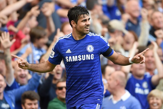 Chelsea’s Diego Costa celebrates scoring his side's third goal against Swansea City during their English Premier League soccer match at Stamford Bridge, London, Saturday, Sept. 13, 2014. (AP Photo/Tim Ireland)