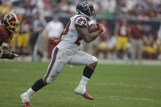 Houston Texans running back Arian Foster (23) makes a run stands on the sidelines during the second quarter of an NFL football game Sunday, Sept. 7, 2014, in Houston. (AP Photo/Patric Schneider)