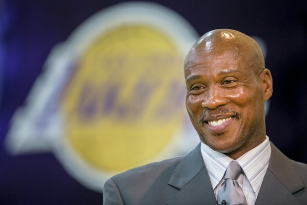 Byron Scott is introduced as the successor to Mike D'Antoni as the Lakers' head coach during a news conference in Los Angeles Tuesday, July 29, 2014. Scott is coming home for his fourth NBA coaching job. He inherits a team that missed the playoffs for just the third time in 38 years. (AP Photo/Damian Dovarganes)