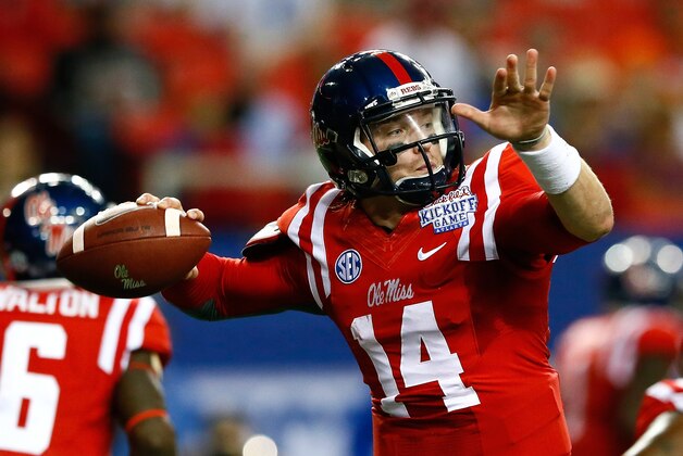 ATLANTA, GA - AUGUST 28:  Bo Wallace #14 of the Mississippi Rebels looks to pass against the Boise State Broncos at Georgia Dome on August 28, 2014 in Atlanta, Georgia.  (Photo by Kevin C. Cox/Getty Images)