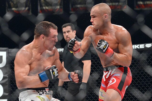 Nov 2, 2013; Long Beach, CA, USA;   Eddie Alvarez (red gloves) and Michael Chandler (blue gloves) during their Bellator lightweight world championship fight at the Long Beach Arena. Alvarez won the fight. Mandatory Credit: Jayne Kamin-Oncea-USA TODAY Sports