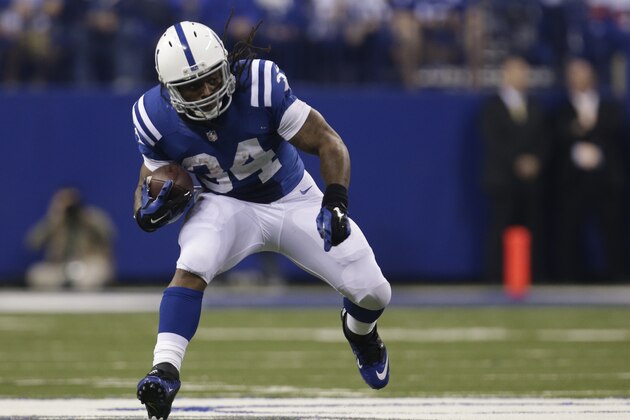 Indianapolis Colts running back Trent Richardson (34) runs during the first half of an NFL football game against the Philadelphia Eagles Monday, Sept. 15, 2014, in Indianapolis. (AP Photo/AJ Mast)