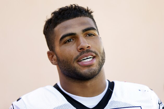 Philadelphia Eagles inside linebacker Mychal Kendricks speaks with members of the media  after NFL football practice at the team's training facility, Friday, Sept. 12, 2014, in Philadelphia. (AP Photo/Matt Rourke)