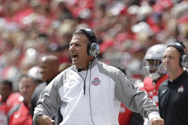 Ohio State head coach Urban Meyer on on the sidelines against Kent State during an NCAA college football game Saturday, Sept. 13, 2014, in Columbus, Ohio. (AP Photo/Jay LaPrete)