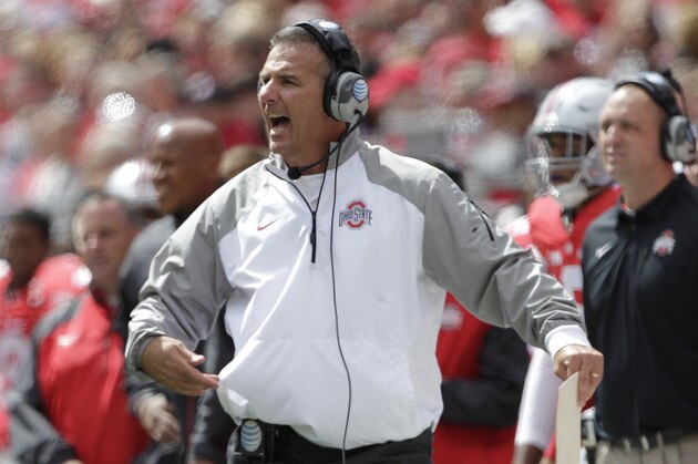 Ohio State head coach Urban Meyer on on the sidelines against Kent State during an NCAA college football game Saturday, Sept. 13, 2014, in Columbus, Ohio. (AP Photo/Jay LaPrete)