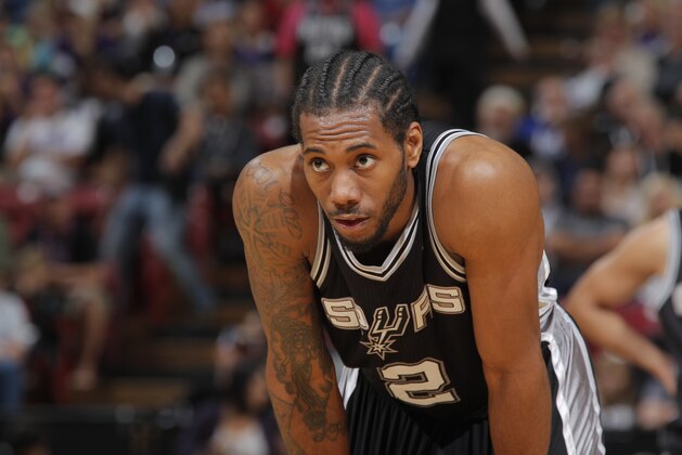 SACRAMENTO, CA - MARCH 21: Kawhi Leonard #2 of the San Antonio Spurs in a game against the Sacramento Kings on March 21, 2014 at Sleep Train Arena in Sacramento, California. NOTE TO USER: User expressly acknowledges and agrees that, by downloading and or using this photograph, User is consenting to the terms and conditions of the Getty Images Agreement. Mandatory Copyright Notice: Copyright 2014 NBAE (Photo by Rocky Widner/NBAE via Getty Images)