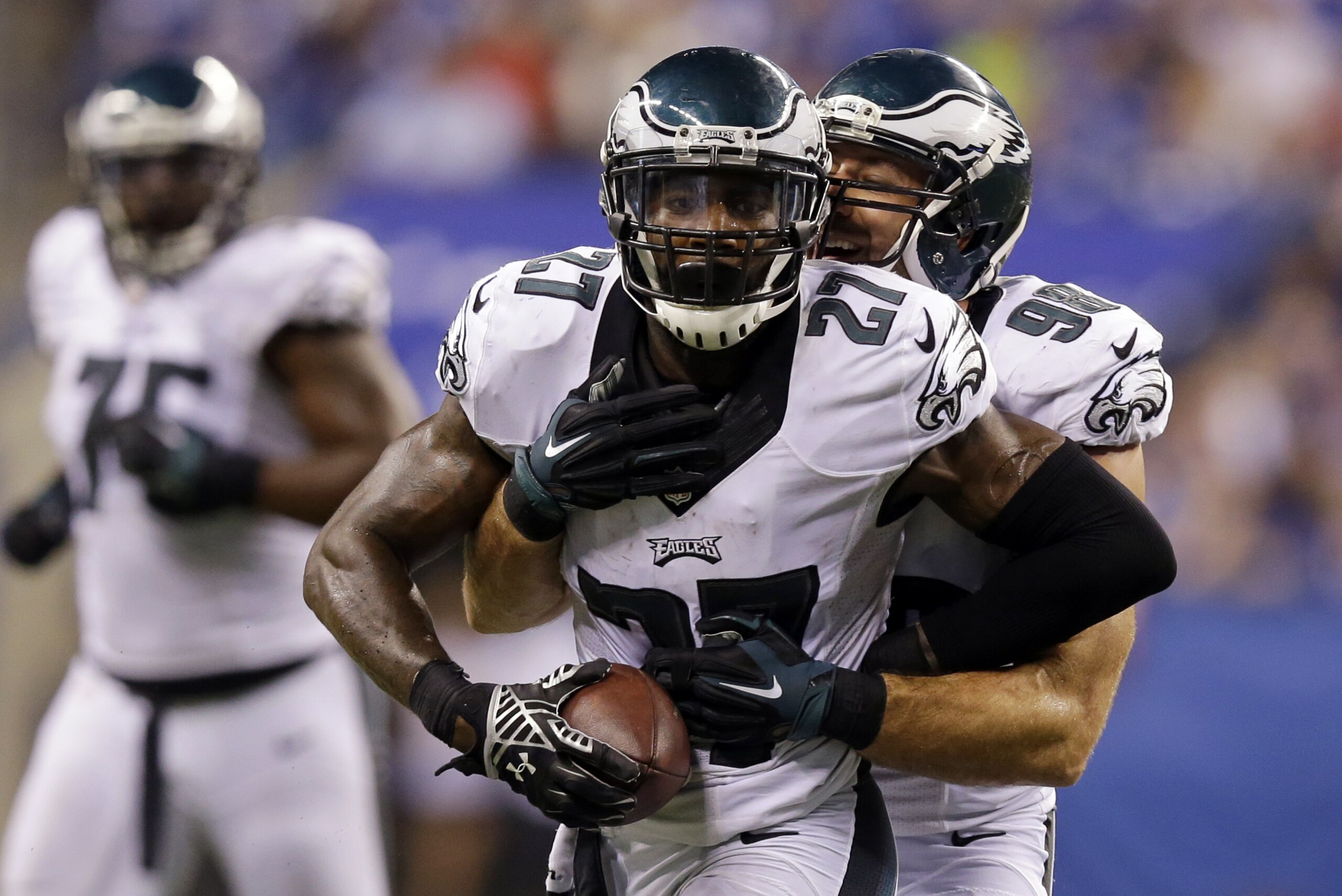 Philadelphia Eagles free safety Malcolm Jenkins (27) celebrates with Connor Barwin (98) after Jenkins made an interception during the second half of an NFL football game against the Indianapolis Colts Monday, Sept. 15, 2014, in Indianapolis. (AP Photo/Michael Conroy)