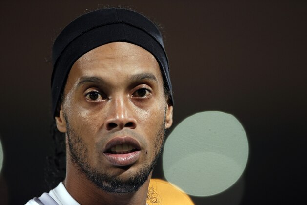 Atletico Mineiro's Ronaldinho looks on during the semi final soccer match between Raja Casablanca and Atletico Mineiro at the Club World Cup soccer tournament in Marrakech, Morocco, Wednesday, Dec. 18, 2013. (AP Photo/Christophe Ena)