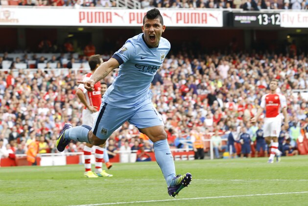 Manchester City's Sergio Aguero celebrates scoring a goal during the English Premier League soccer match between Arsenal and Manchester City at Emirates Stadium in London, Saturday, Sept. 13, 2014. (AP Photo/Kirsty Wigglesworth) Manchester City's Sergio Aguero celebrates scoring a goal during the English Premier League soccer match between Arsenal and Manchester City at Emirates Stadium in London, Saturday, Sept. 13, 2014. (AP Photo/Kirsty Wigglesworth)