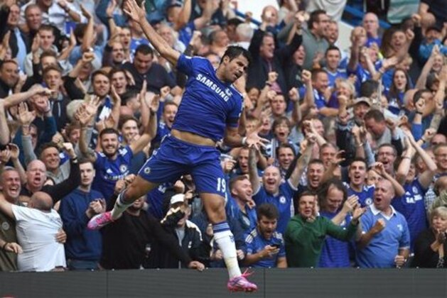 Chelsea’s Diego Costa celebrates scoring his side's second goal against Swansea City during their English Premier League soccer match at Stamford Bridge, London, Saturday, Sept. 13, 2014. (AP Photo/Tim Ireland)