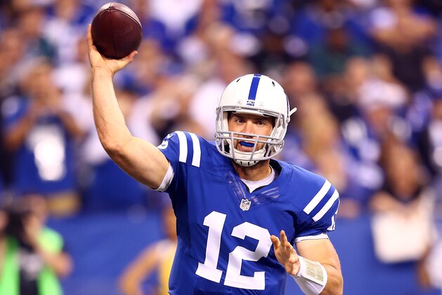 INDIANAPOLIS, IN - SEPTEMBER 15:  Quarterback Andrew Luck #12 of the Indianapolis Colts drops back to pass against the Philadelphia Eagles during a game at Lucas Oil Stadium on September 15, 2014 in Indianapolis, Indiana.  (Photo by Andy Lyons/Getty Images)