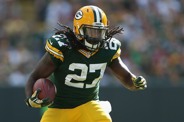 GREEN BAY, WI - SEPTEMBER 14:  Running back Eddie Lacy #27 of the Green Bay Packers rushes the football against the New York Jets during the NFL game at Lambeau Field on September 14, 2014 in Green Bay, Wisconsin.  The Packers defeated the Jets 31-24.  (Photo by Christian Petersen/Getty Images)