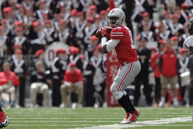 Ohio State quarterback J.T. Barrett plays against Kent State during an NCAA college football game Saturday, Sept. 13, 2014, in Columbus, Ohio. (AP Photo/Jay LaPrete)