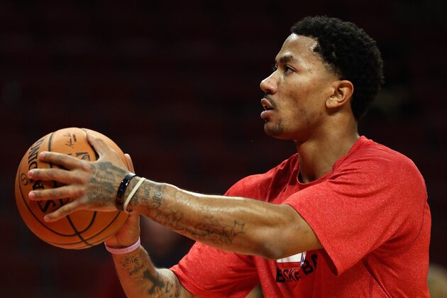 CHICAGO, IL - FEBRUARY 11:  Derrick Rose #1 of the Chicago Bulls, who suffered a season-ending knee injury in November, practices his shooting before the Bulls take on the Atlanta Hawks at the United Center on February 11, 2014 in Chicago, Illinois. NOTE TO USER: User expressly acknowledges and agrees that, by downloading and or using this photograph, User is consenting to the terms and conditions of the Getty Images License Agreement.  (Photo by Jonathan Daniel/Getty Images)
