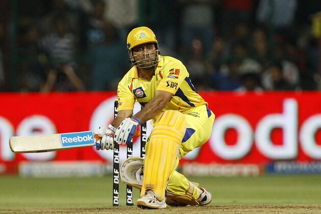 Chennai Super Kings' captain Mahendra Singh Dhoni prepares to play a shot during their Indian Premier League (IPL) playoff cricket match against Mumbai Indians' in Bangalore, India, Wednesday, May 23, 2012.  (AP Photo/Aijaz Rahi)