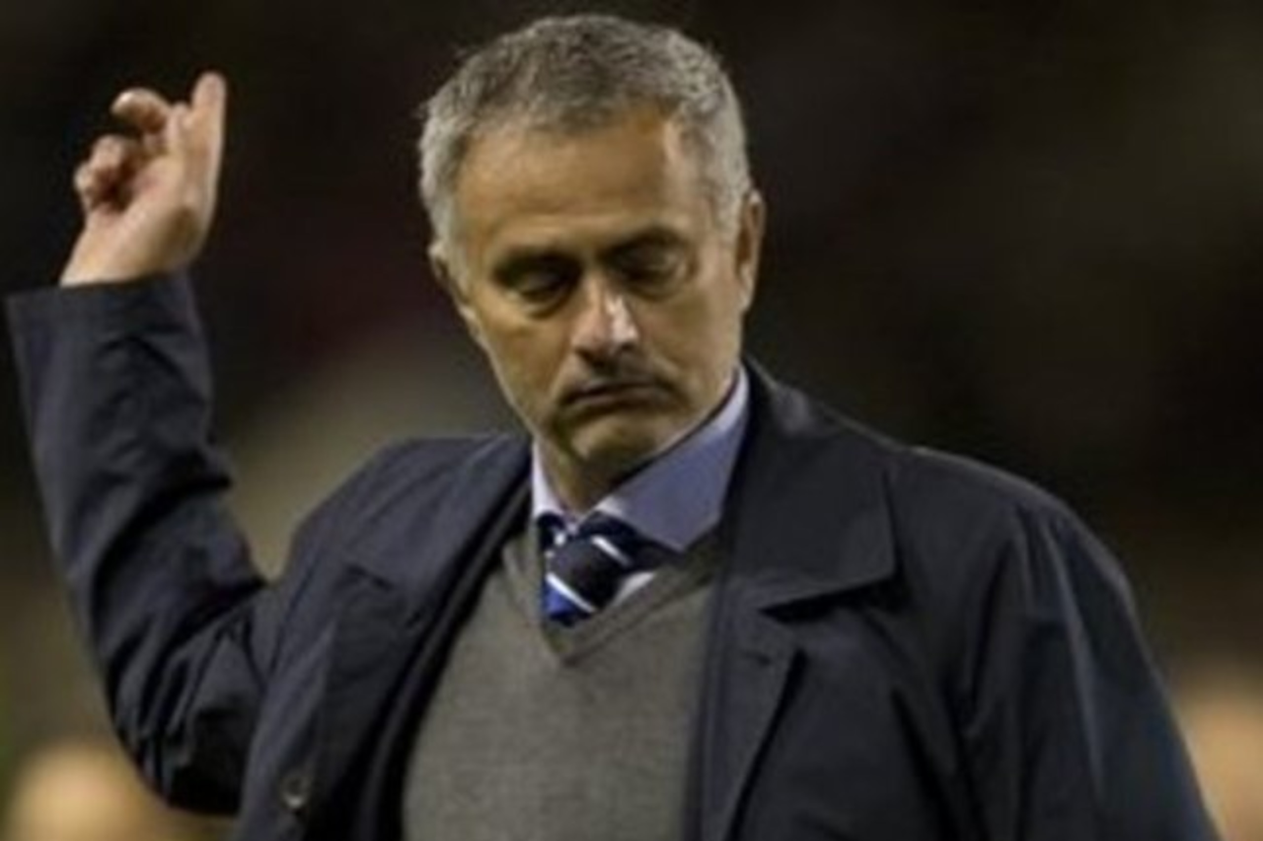 Chelsea's manager Jose Mourinho gestures as he walks from the pitch after his team's 3-1 win at Burnley in their English Premier League soccer match at Turf Moor Stadium, Burnley, England, Monday Aug. 18, 2014. (AP Photo/Jon Super)