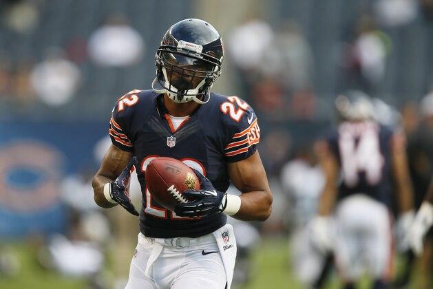 Chicago Bears running back Matt Forte (22) warms up before an NFL preseason football game against the Jacksonville Jaguars  in Chicago, Thursday, Aug. 14, 2014. (AP Photo/Andrew Nelles)