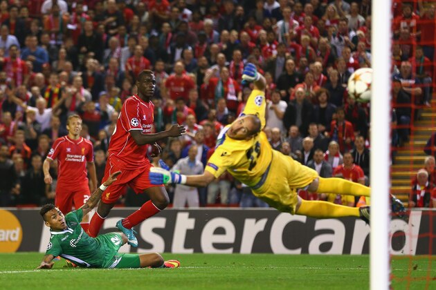 LIVERPOOL, ENGLAND - SEPTEMBER 16:  Mario Balotelli of Liverpool scores the opening goal past Milan Borjan of PFC Ludogorets Razgrad  during the UEFA Champions League Group B match between Liverpool FC and PFC Ludogorets Razgrad at Anfield on September 16, 2014 in Liverpool, United Kingdom.  (Photo by Clive Brunskill/Getty Images)