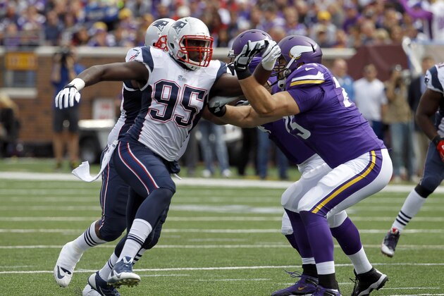 New England Patriots defensive end Chandler Jones (95) takes up his position during the third quarter of an NFL football game against the Minnesota Vikings Sunday, Sept. 14, 2014, in Minneapolis. (AP Photo/Ann Heisenfelt)