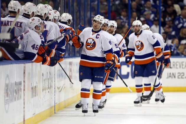 TAMPA, FL - JANUARY 16:  John Tavares #91 of the New York Islanders celebrates a goal against the Tampa Bay Lightning at the Tampa Bay Times Forum on January 16, 2014 in Tampa, Florida. (Photo by Mike Carlson/Getty Images)