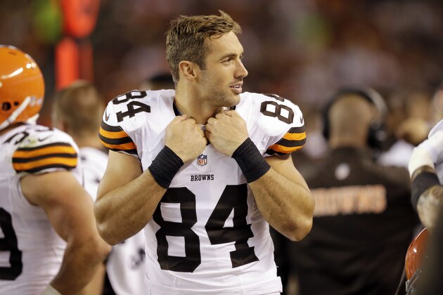 Cleveland Browns tight end Jordan Cameron watches from the bench in the second quarter of a preseason NFL football game against the Chicago Bears Thursday, Aug. 28, 2014, in Cleveland. (AP Photo/Tony Dejaj)