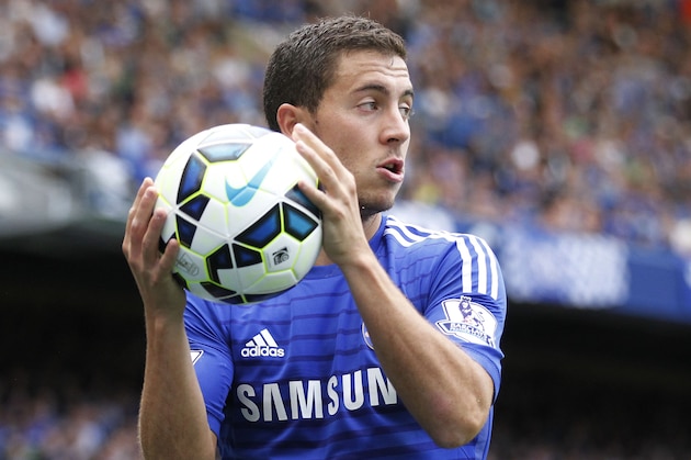 Chelsea's Eden Hazard plays against Leicester City during their English Premier League soccer match at Stamford Bridge, London, Saturday, Aug. 23, 2014. (AP Photo/Sang Tan)