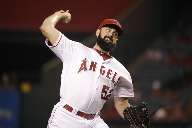 Los Angeles Angels starting pitcher Matt Shoemaker throws against the Seattle Mariners during the first inning of a baseball game Monday, Sept. 15, 2014, in Anaheim, Calif. (AP Photo/Jae C. Hong)