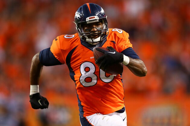DENVER, CO - SEPTEMBER 7:  Tight end Julius Thomas #80 of the Denver Broncos runs for yards after a reception against the Indianapolis Colts during a game at Sports Authority Field at Mile High on September 7, 2014 in Denver, Colorado.  (Photo by Jeff Gross/Getty Images)