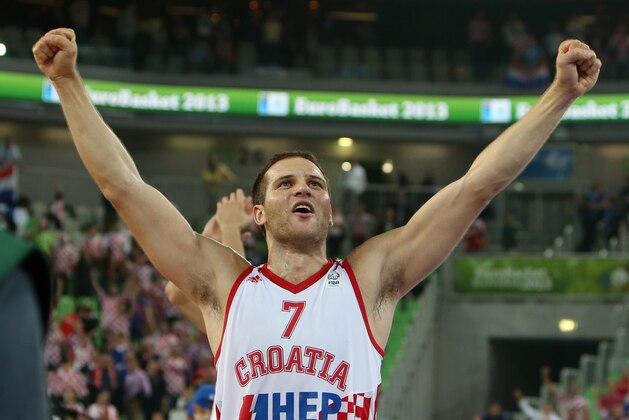 Croatia's Bojan Bogdanovic celebrates after a EuroBasket European Basketball Championship quarterfinal match against Ukraine at the Stozice Arena, in Ljubljana, Slovenia, Thursday, Sept. 19, 2013. Croatia  won 84-72. (AP Photo/Thanassis Stavrakis)