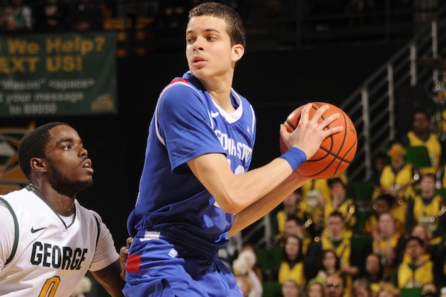 Feb 16, 2013; Fairfax, VA, USA; Georgia State Panthers guard R.J. Hunter (22) looks to pass in front of George Mason Patriots guard Bryon Allen (0) during the first half at Patriot Center. Mandatory Credit: Rafael Suanes-USA TODAY Sports