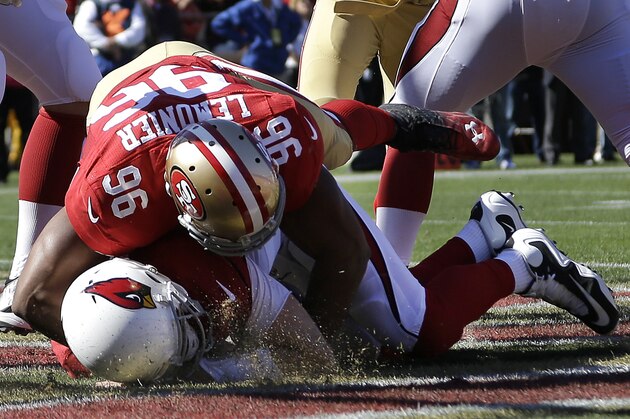 San Francisco 49ers linebacker Corey Lemonier (96) sacks Arizona Cardinals quarterback Carson Palmer for a safety during the second quarter of an NFL football game in San Francisco, Sunday, Oct. 13, 2013. (AP Photo/Ben Margot)